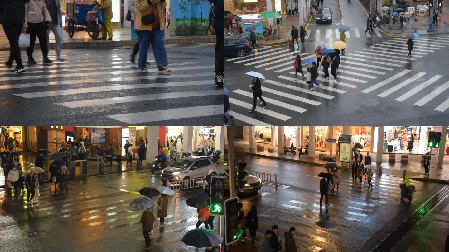 厦门繁华街道路口雨天行人夜景