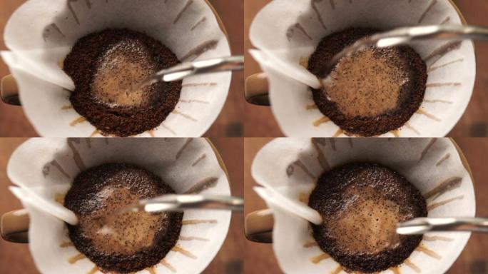 用蒸汽过滤滴滤方式煮咖啡。