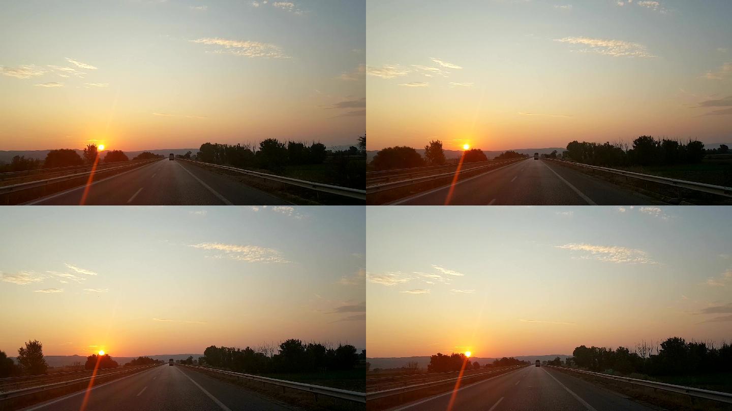 日落中的公路之旅高速夕阳逐日落日