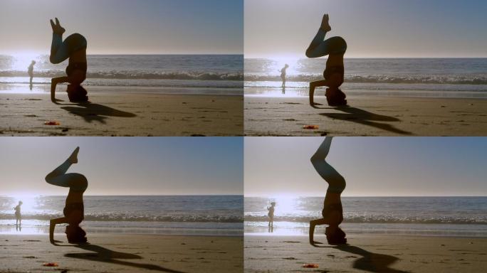 在海滩上练瑜伽冥想健身教练柔韧