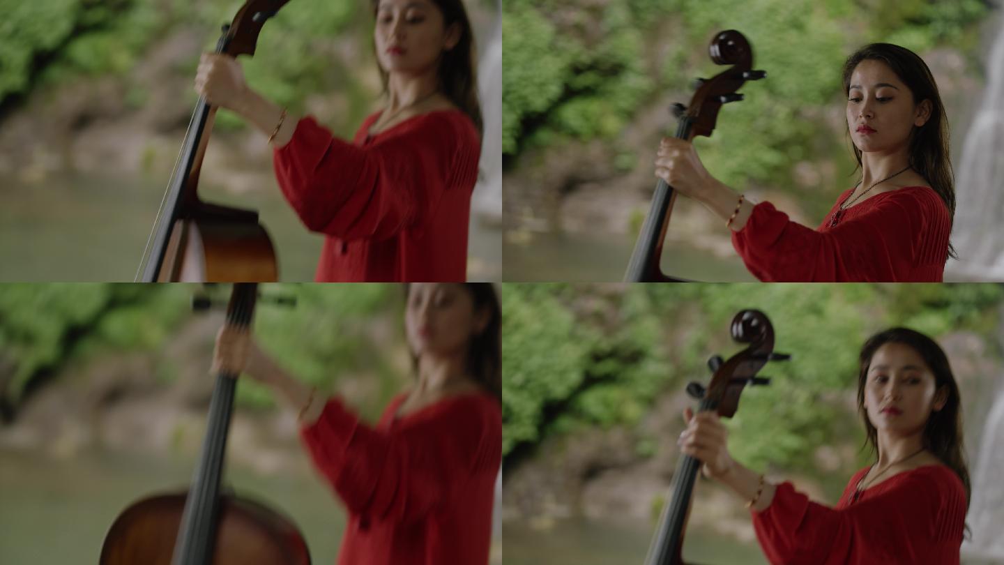 女孩湖边拉大提琴