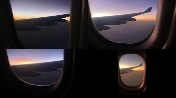 透过飞机舱窗户看日出