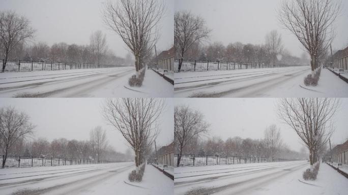 冬季下雪的马路行驶的车辆