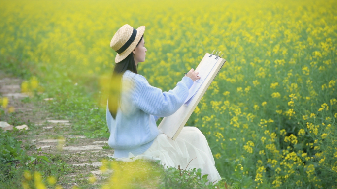 4K油菜花海里的少女