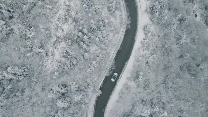 高清航拍森林公路雪山雪景