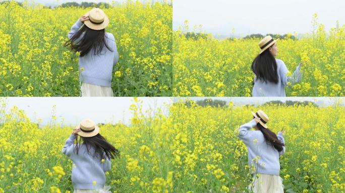 升格油菜花花海里的少女