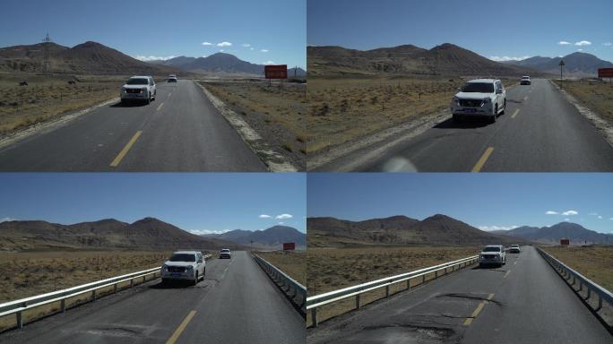 汽车行驶在西藏高原