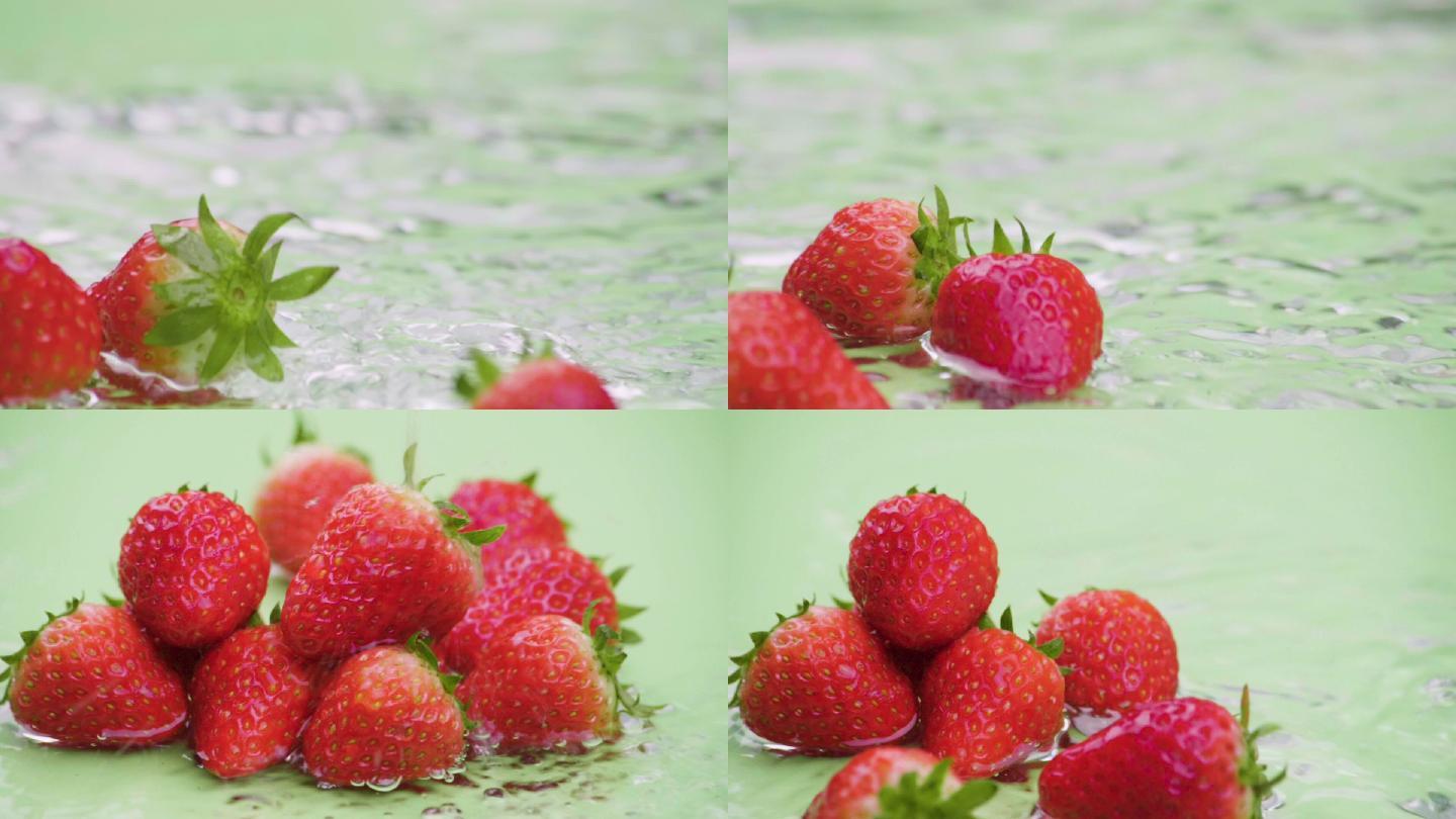 草莓落入浅水溅起水花