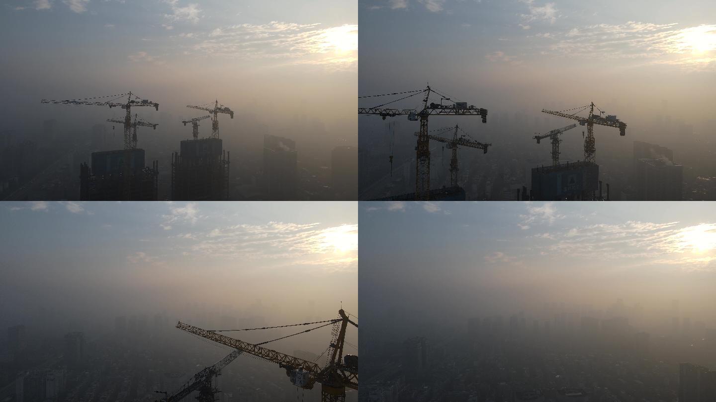 城市阴天雾霾天气建筑工地塔吊城市鸟瞰航拍