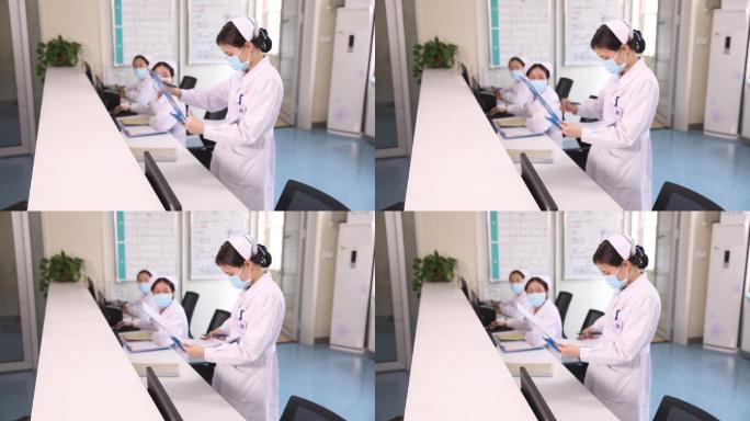 三个护士在护理站工作