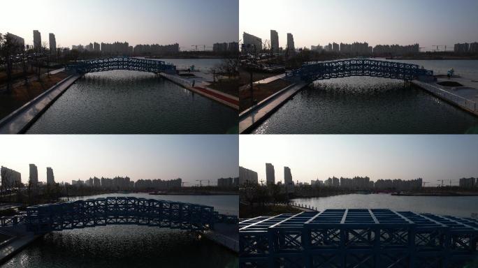 4k航拍 上海之鱼 越过湖面蓝色的桥