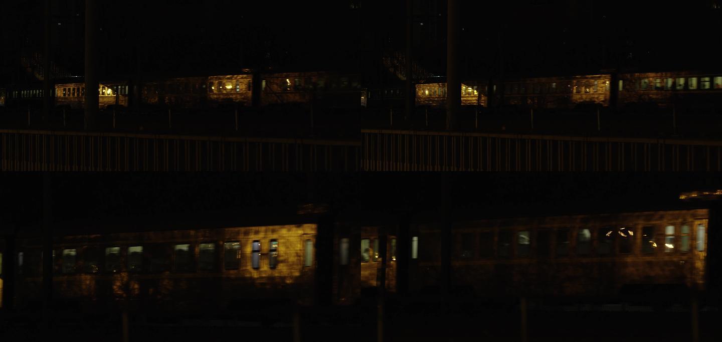 漆黑的晚上，城市昏暗的路灯，夜景绿皮火车