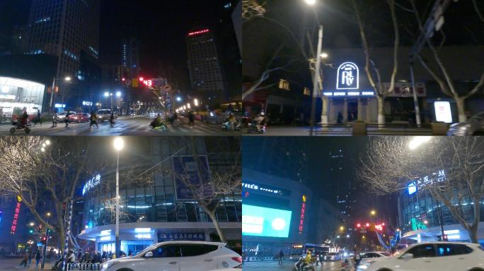 夜晚南京新街口车右空镜影视素材