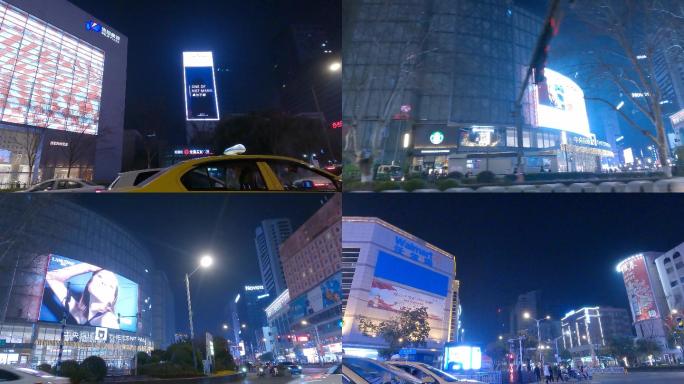 夜晚南京新街口车左空镜影视素材