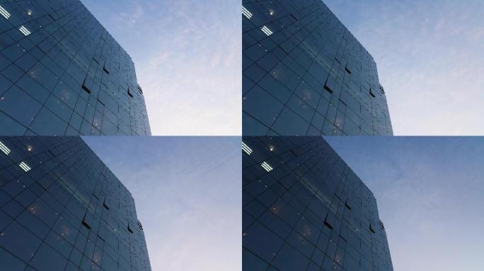 玻璃大楼反射蓝天白云风云变幻
