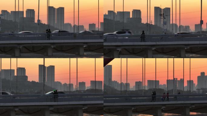 日落大桥上散步的情侣