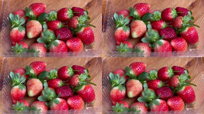 一盒刚采摘的新鲜的草莓