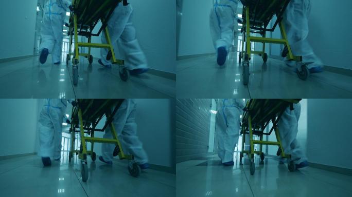 医生们在走廊里移动担架。