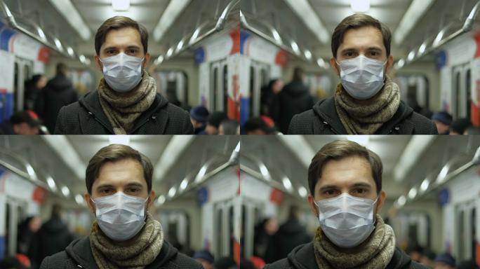 地铁客运列车内戴着口罩的男子