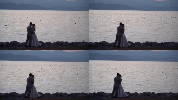 情侣在海边拍婚纱照