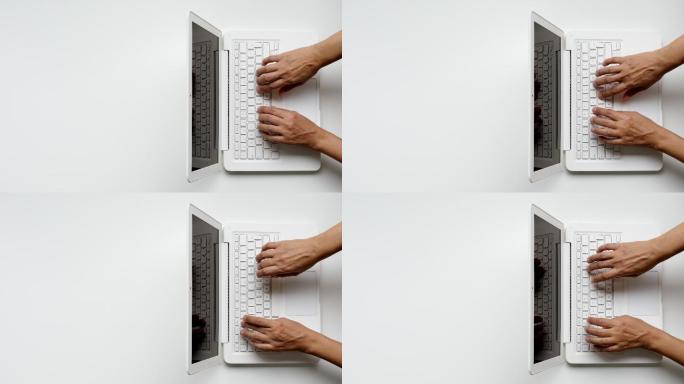 女性使用笔记本电脑键盘，关闭盖子