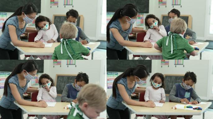 学生戴着口罩画画疫情期间戴口罩