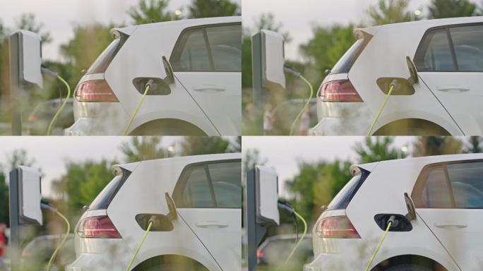 一辆汽车在城市停车场充电的慢镜头。