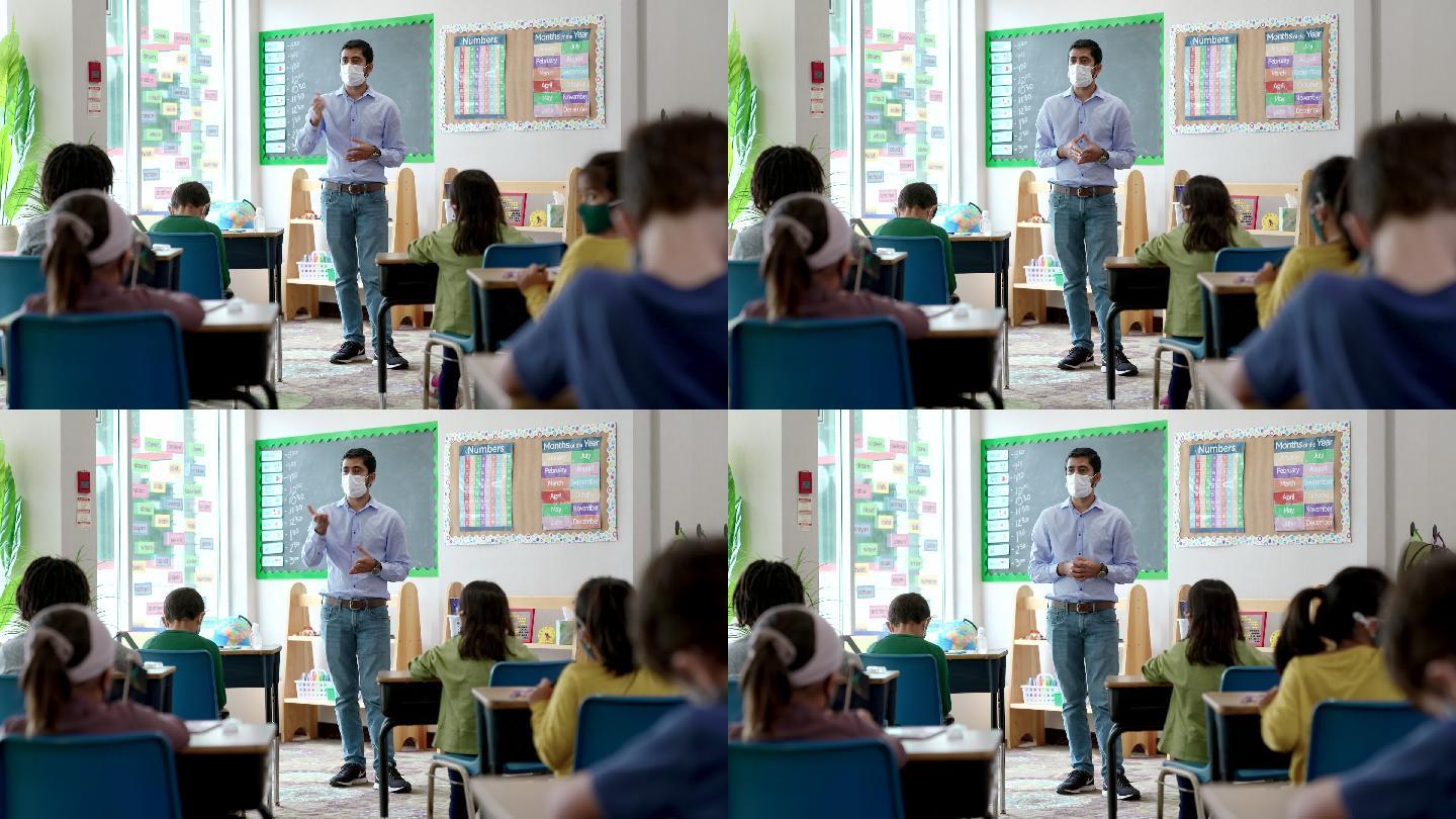 男教师在课堂上对学生讲话