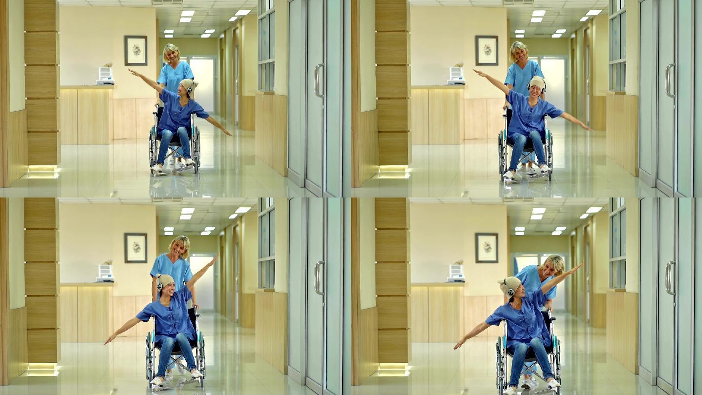 女医生在医院与微笑的患者玩耍