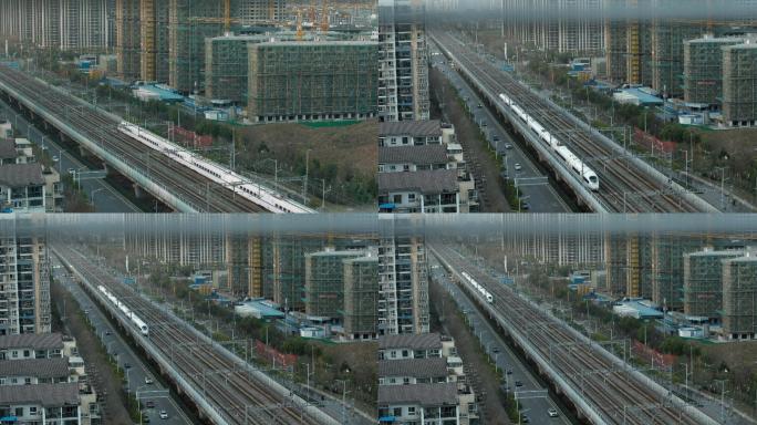 俯拍高铁行驶穿梭城市空镜