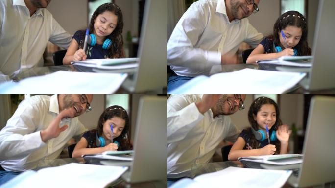 父亲在家里帮助女儿做作业，上网课