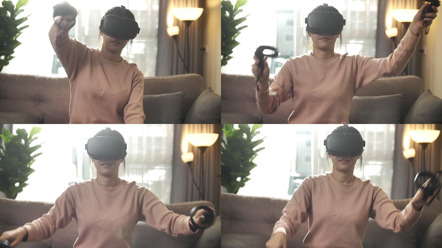 女人坐在沙发上，在家里戴着VR眼镜