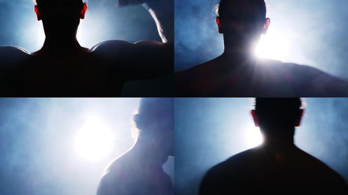 展示肌肉的男人影片烟雾剪影光影高品质