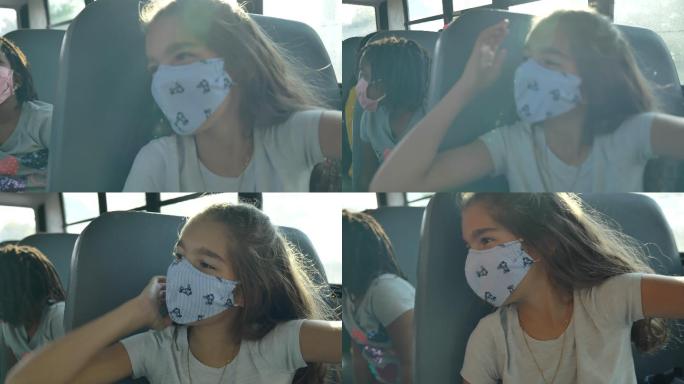 在公共汽车上戴口罩的小学生