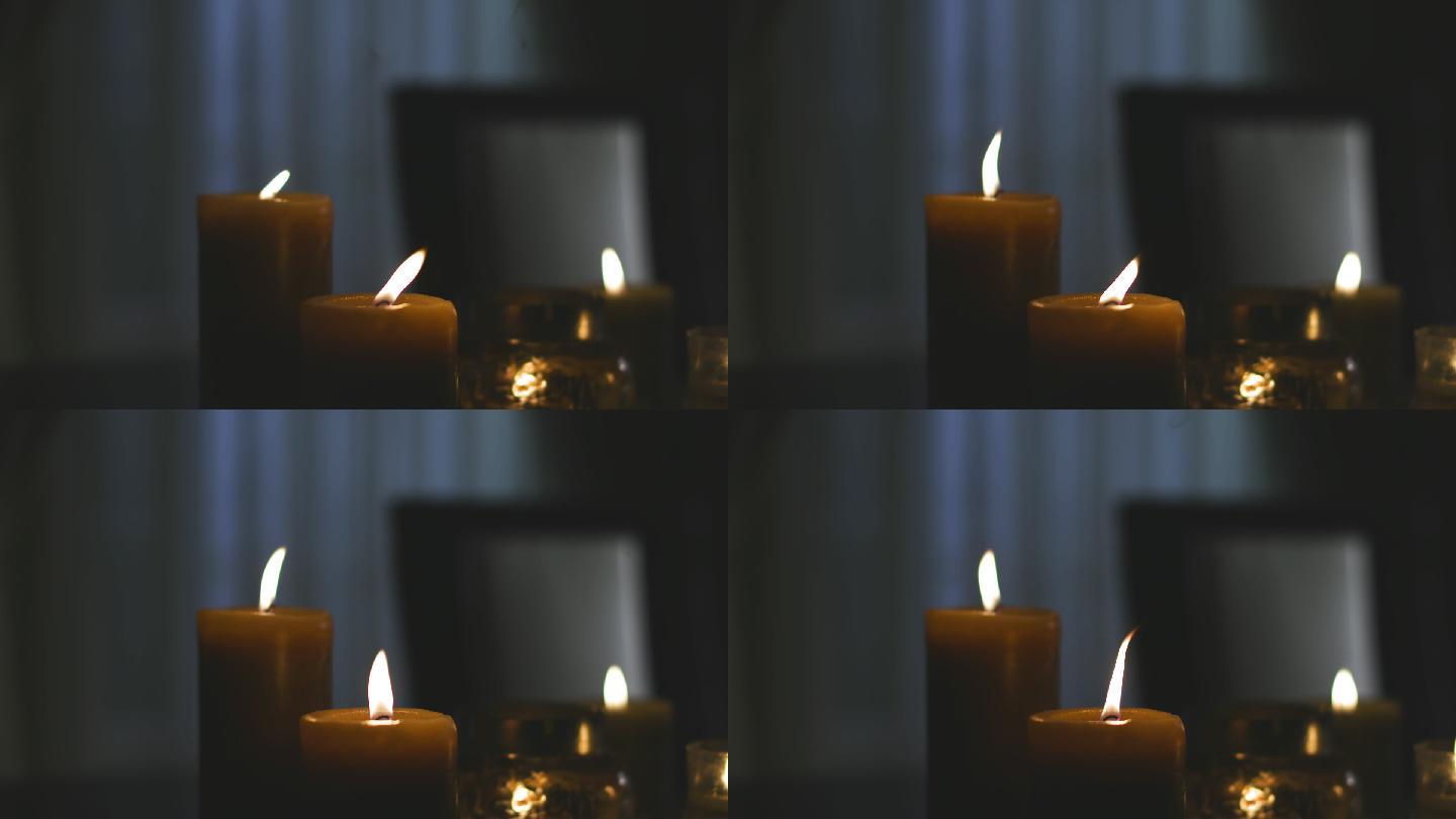 停电时，蜡烛照亮了一个黑暗的家。