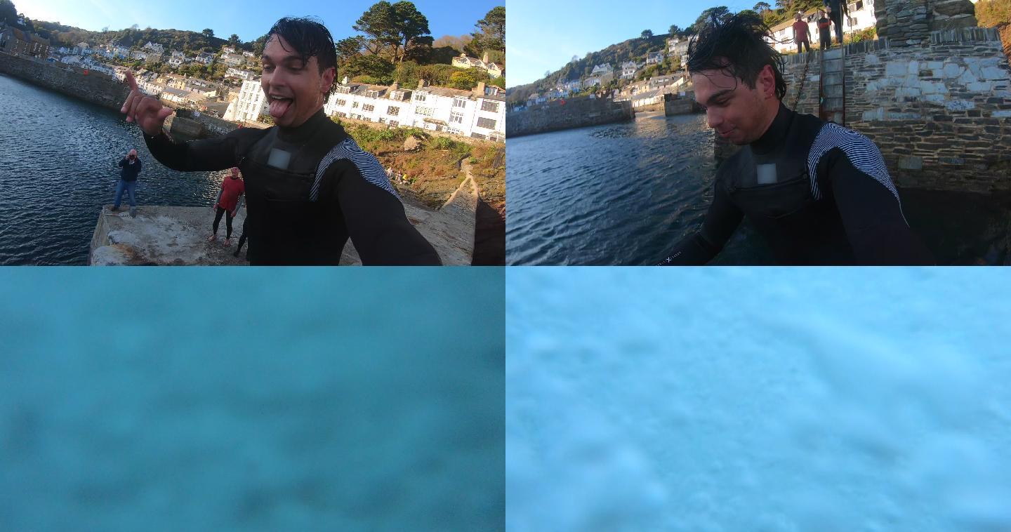 一名男性穿着潜水服从港口跳入大海