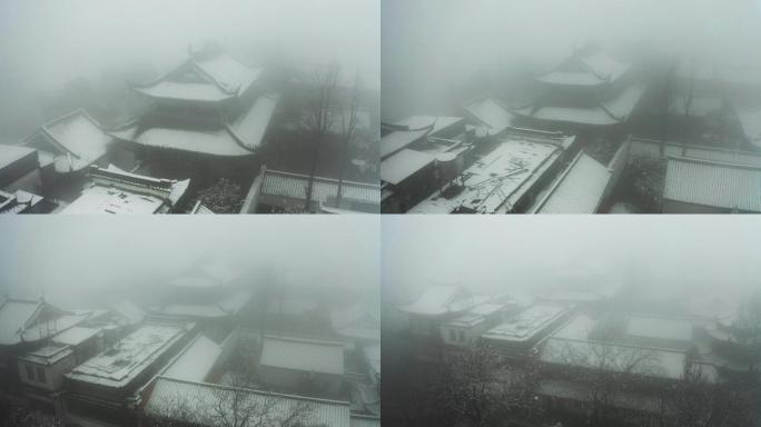大雪中的杭州玉皇山古建筑积雪大气航拍4K