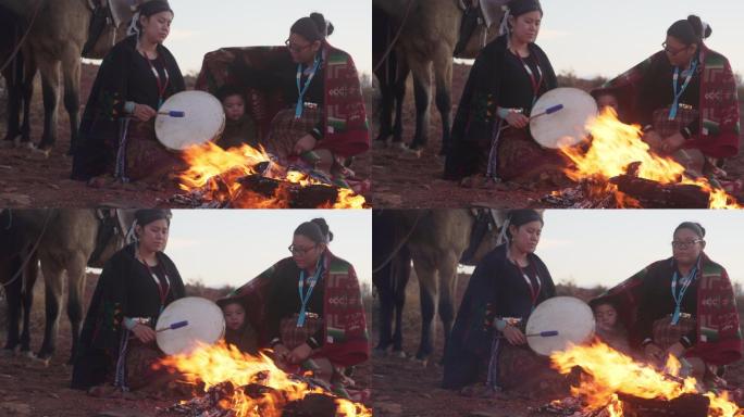 坐在篝火旁的人宗教信仰木材燃烧实拍视频