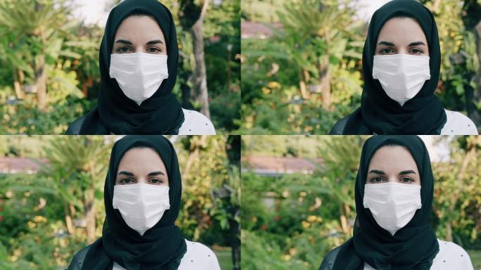 妇女戴医用口罩，以防感染病毒。