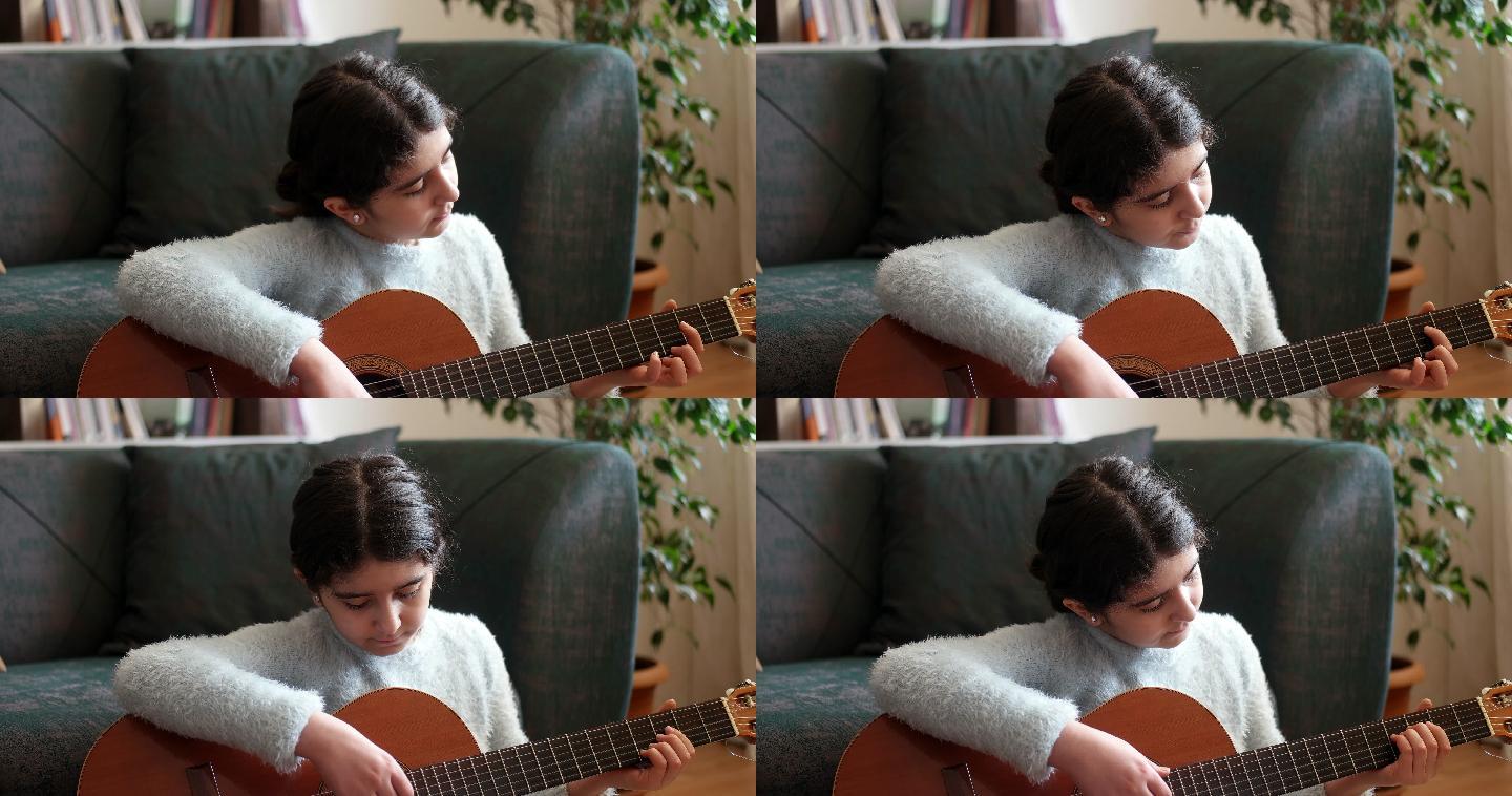 练习吉他的少女外国女孩弹琴