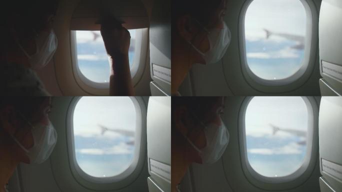 飞机上的乘客看向窗外
