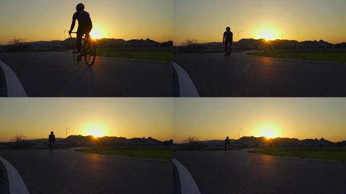 骑着自行车向着朝阳出发