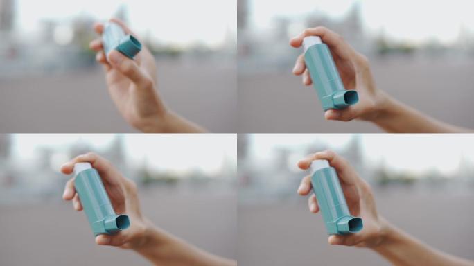 慢动作女性使用哮喘吸入器