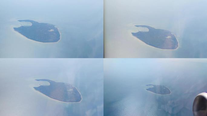 绵阳飞海口-飞机窗外云大海与广西涠洲岛