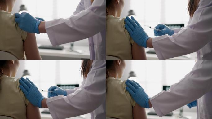 护士在病人手臂上接种疫苗，慢动作