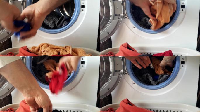 男人把脏衣服扔进洗衣机里