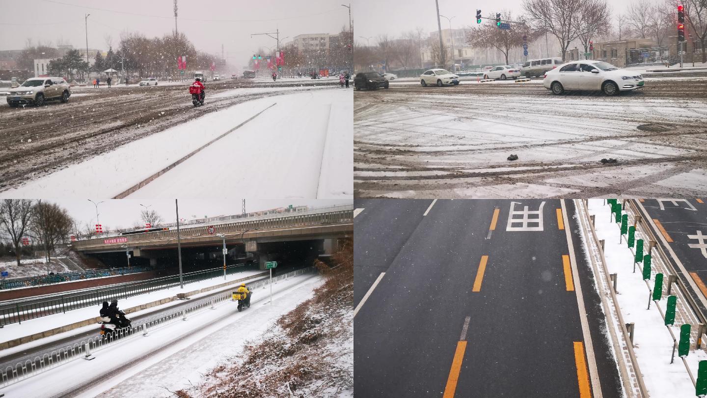 下雪中的城市交通红绿灯高速路