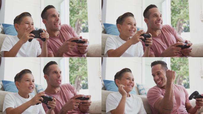 父子坐在家里一起玩电子游戏
