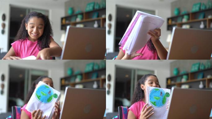女孩在家上网课线上教学外国小女生画地球