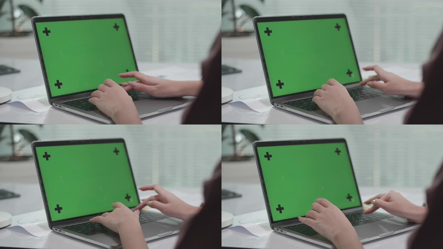 女性在家使用笔记本电脑绿屏